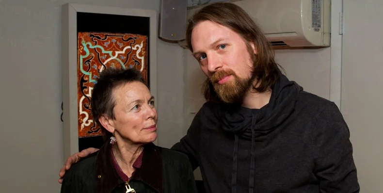 Laurie Anderson and Sarth Calhoun, his arm around her shoulders, at the Gralbum launch.